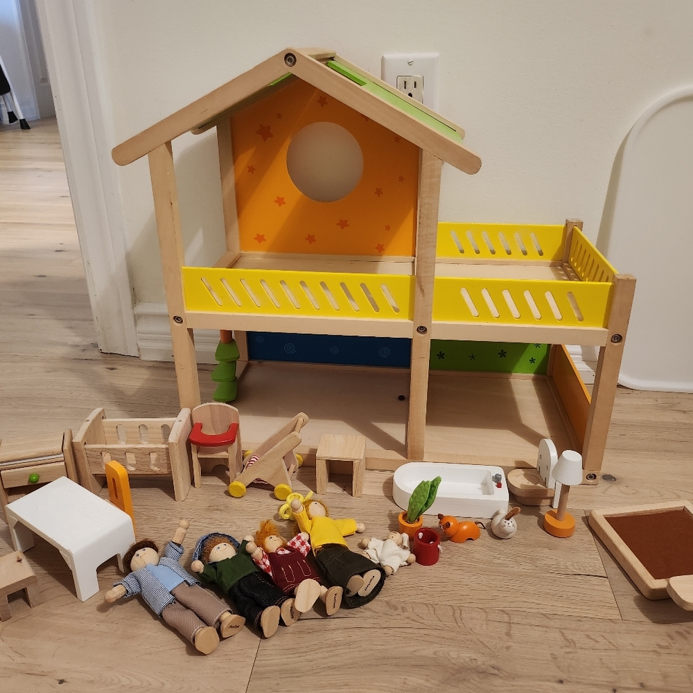 Hape wooden dollhouse and accessories